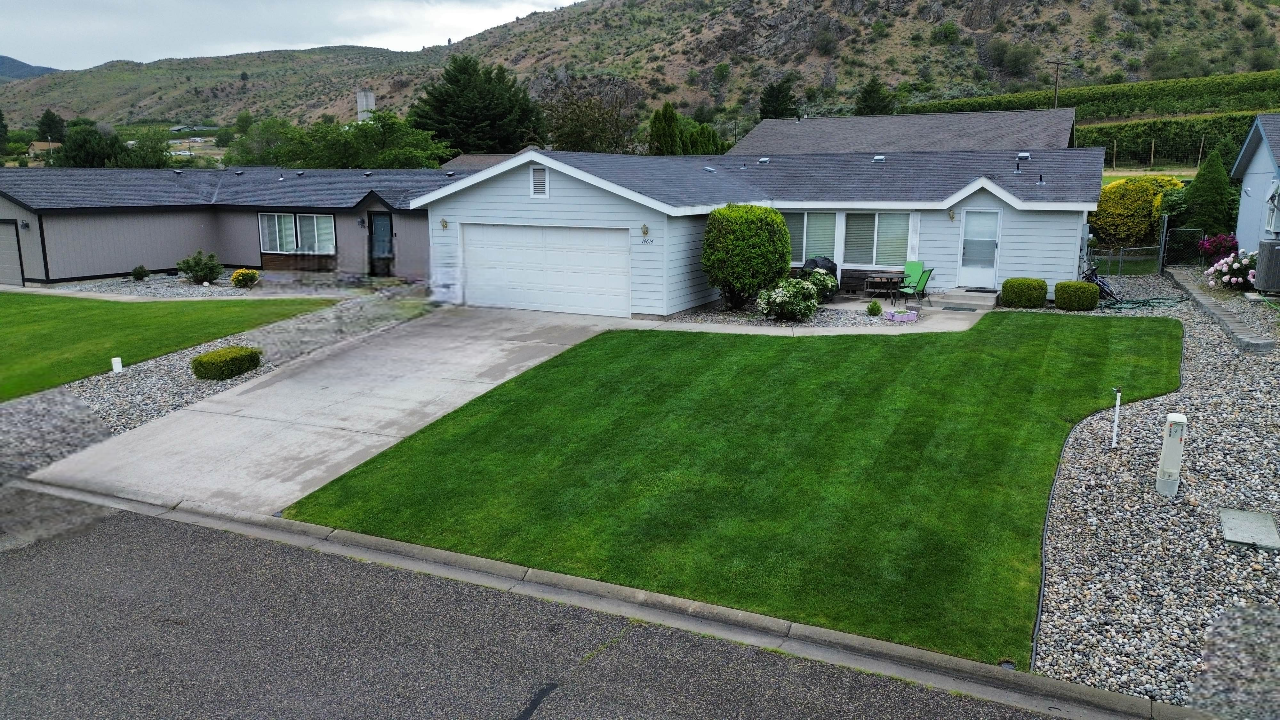 Stunning lawn with beautiful home